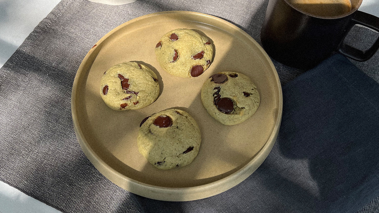 Matcha chocolate chip cookies on a plate.